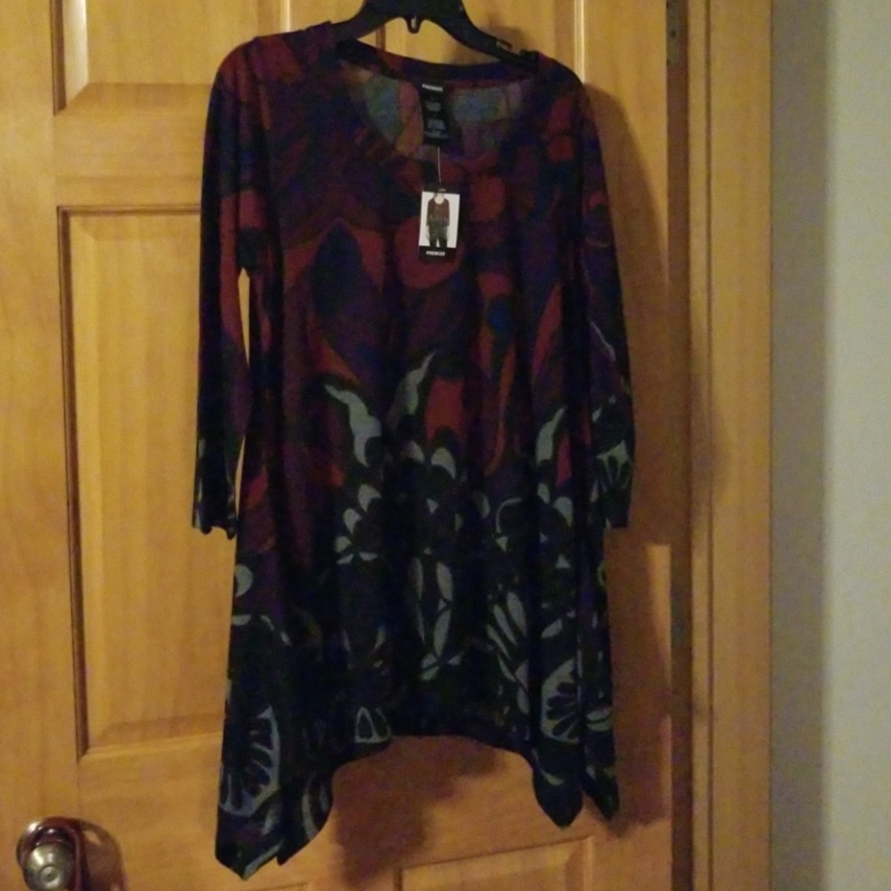 There are 2 Tops for $15.00 see Photos